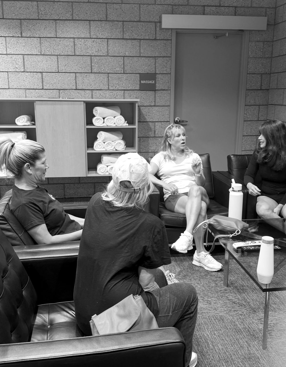 Women from Cohort 1 and Cohort 2 talking together after a pop-up session